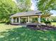 Community pavilion featuring stone accents, tables and ample space for social gatherings and outdoor enjoyment at 17204 Caldwell Track Dr, Huntersville, NC 28078