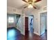Open living area with hardwood floors, interior doors, staircase and stylish trim at 208 N 5Th St, Albemarle, NC 28001