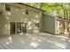 Exterior view of the home's large back deck with sliding glass doors at 2310 Vestry Pl, Charlotte, NC 28270