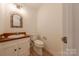 Cozy bathroom with vintage mirror and vanity at 2310 Vestry Pl, Charlotte, NC 28270