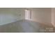 Cozy bedroom with carpet, and closet at 2310 Vestry Pl, Charlotte, NC 28270