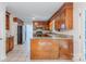 Traditional kitchen showcasing wood cabinets, granite countertops, and stainless appliances at 2310 Vestry Pl, Charlotte, NC 28270