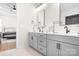 Main bathroom with double vanity, modern fixtures, and access to the main bedroom at 2396 Lee Lawing Rd, Lincolnton, NC 28092
