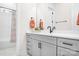 Stylish bathroom featuring a gray vanity with dual sinks and black hardware at 2396 Lee Lawing Rd, Lincolnton, NC 28092
