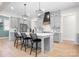 Stylish kitchen with an island, pendant lighting, stainless steel appliances, and grey cabinetry at 2396 Lee Lawing Rd, Lincolnton, NC 28092