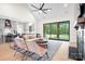 Bright living space, seamlessly connecting the modern living room, kitchen, and picturesque backyard at 2396 Lee Lawing Rd, Lincolnton, NC 28092