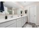 Bright primary bathroom with dual sinks, modern vanity, and a glass door shower at 2754 Legacy Ridge Ln, Catawba, NC 28609