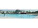 Resort-style swimming pool surrounded by a black metal fence and community buildings at 2754 Legacy Ridge Ln, Catawba, NC 28609