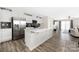 Bright, modern kitchen with a large island, stainless steel appliances, and open view to the living area at 2754 Legacy Ridge Ln, Catawba, NC 28609