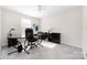This home office features a ceiling fan, natural light, and modern decor at 2754 Legacy Ridge Ln, Catawba, NC 28609