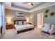 Tranquil bedroom features a tray ceiling, neutral color palette, and plush carpet for ultimate comfort at 3424 Saint Clair Nw Ct, Concord, NC 28027