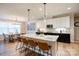 Modern kitchen features a marble island with seating, stainless steel appliances, and ample counter space at 3424 Saint Clair Nw Ct, Concord, NC 28027