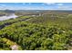 Expansive aerial view of lush greenery, lakes, and natural landscape at 3755 River Rd, Richfield, NC 28137