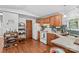 Kitchen featuring hardwood floors, appliances, and wood cabinets at 3755 River Rd, Richfield, NC 28137