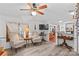 Bright living room featuring comfortable seating, window views, and access to the kitchen area at 3755 River Rd, Richfield, NC 28137