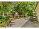 This brick patio features a stone fireplace and plenty of room to relax at 3755 River Rd, Richfield, NC 28137
