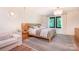Calm primary bedroom with bright light from large window and modern accents at 4316 Old Saybrook Ct, Charlotte, NC 28211