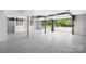 Spacious garage featuring a clean, modern epoxy floor and a contemporary garage door at 4316 Old Saybrook Ct, Charlotte, NC 28211