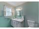 Bathroom view showing a mirror and sink at 439 Kershaw Country Club Rd, Kershaw, SC 29067