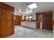 Kitchen with lots of cabinets, linoleum flooring and a door at 439 Kershaw Country Club Rd, Kershaw, SC 29067