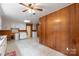 Kitchen view of lots of cabinets and linoleum flooring at 439 Kershaw Country Club Rd, Kershaw, SC 29067