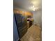 Bright kitchen featuring stainless steel appliances and ample cabinet space for storage at 521 Donatello Ave, Charlotte, NC 28205