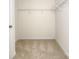 Spacious walk-in closet with shelving for storage and organization at 5523 Pamplona Way, Charlotte, NC 28214