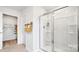Contemporary bathroom with a glass-enclosed shower, linen closet, and modern fixtures at 5536 Pamplona Way, Charlotte, NC 28214