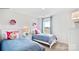 Cheerful ' bedroom with twin beds, pastel accents, and a bright window at 5536 Pamplona Way, Charlotte, NC 28214