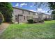 Beautifully maintained backyard featuring lush grass and a well-placed wooden deck at 5633 Open Book Ln, Charlotte, NC 28270