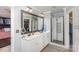 Luxurious bathroom with double vanity, glass shower, and a large mirror at 600 Old Hardin Rd, Dallas, NC 28034