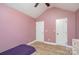 Bright pink bedroom with vaulted ceilings and two large closets at 600 Old Hardin Rd, Dallas, NC 28034