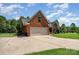 Beautiful brick home featuring an attached garage and a spacious driveway at 600 Old Hardin Rd, Dallas, NC 28034