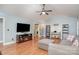 Cozy living room featuring hardwood floors, vaulted ceiling and neutral colors at 600 Old Hardin Rd, Dallas, NC 28034