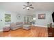 Cozy living room featuring hardwood floors and an open-concept design at 600 Old Hardin Rd, Dallas, NC 28034