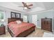 Spacious main bedroom featuring tray ceilings, wood flooring, and natural light at 600 Old Hardin Rd, Dallas, NC 28034