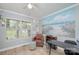 Comfortable home office with calming decor, natural light, and a beach-themed mural at 600 Old Hardin Rd, Dallas, NC 28034