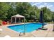 Backyard pool area with furniture and gazebo perfect for entertaining at 600 Old Hardin Rd, Dallas, NC 28034