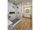 Modern bathroom featuring a walk-in shower, and dual vanity sink at 603 Turnberry Ct, Albemarle, NC 28001
