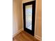 Leaded glass front door with dark trim at 603 Turnberry Ct, Albemarle, NC 28001