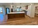 Beautiful kitchen features a center island, modern appliances, and stylish finishes with ample lighting at 603 Turnberry Ct, Albemarle, NC 28001