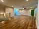 Living room features wood-look floors and a ceiling fan at 603 Turnberry Ct, Albemarle, NC 28001