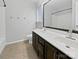 Bathroom featuring double sinks, vanity, and updated fixtures at 6457 Saint Bernard Way, Charlotte, NC 28269