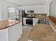 Well-equipped kitchen featuring modern appliances and ample counter space at 6457 Saint Bernard Way, Charlotte, NC 28269