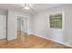 This bedroom has hardwood floors and a mirrored closet at 6609 Pleasant Dr, Charlotte, NC 28211