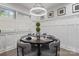 Cozy dining area with stylish chairs, modern lighting, and elegant decor, creating an inviting atmosphere at 6609 Pleasant Dr, Charlotte, NC 28211