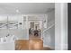 Open-concept view of the dining room with modern chandelier and dining table at 6609 Pleasant Dr, Charlotte, NC 28211