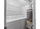 A functional laundry area featuring a washer, dryer, and water heater at 6609 Pleasant Dr, Charlotte, NC 28211