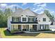 Stunning two-story home featuring a covered porch and a beautifully landscaped front yard at 6814 Forney Hill Rd # 2, Denver, NC 28037