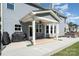 View of the patio, complete with a grill, table, chairs, ceiling fan and a hot tub at 6814 Forney Hill Rd # 2, Denver, NC 28037